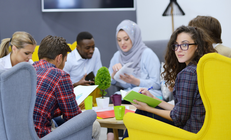Diverse Group of Professionals Working in Open Environment