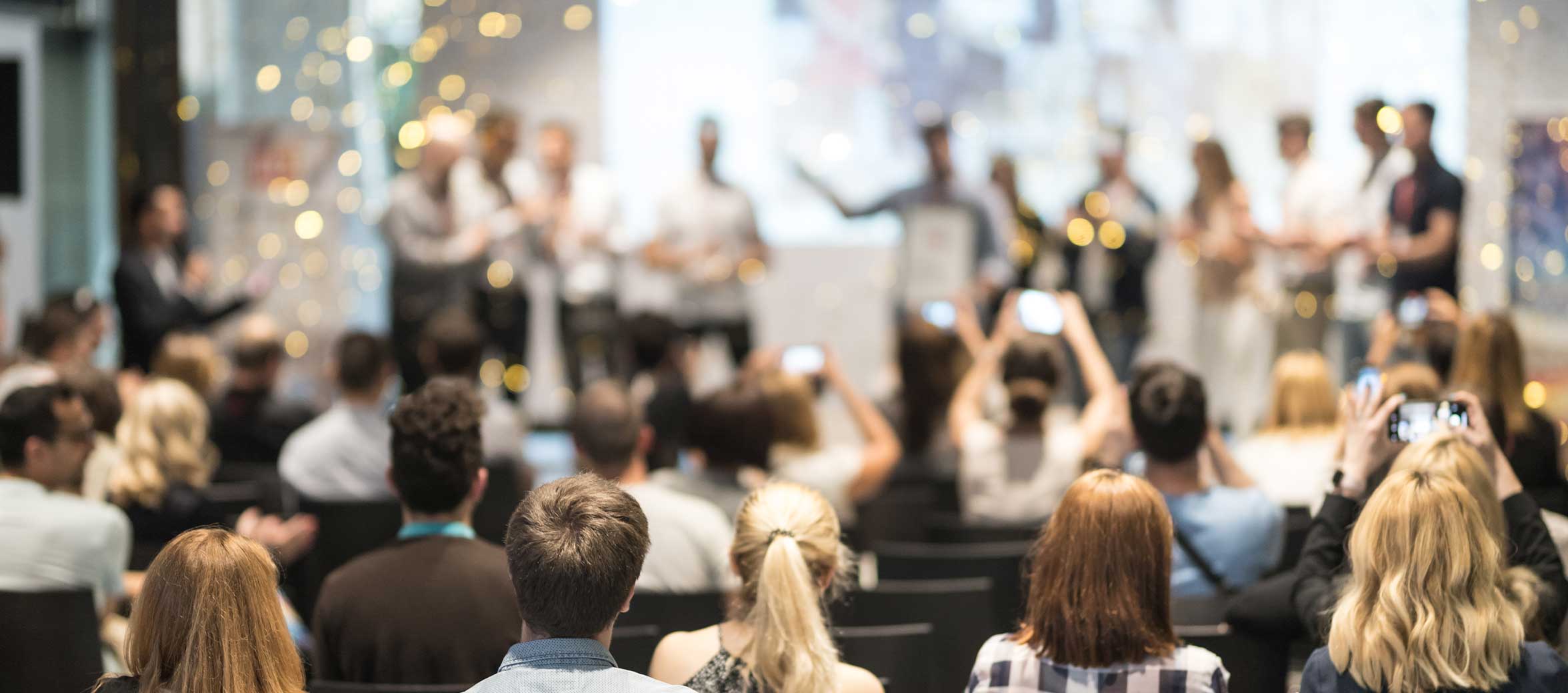 A group of people at an award ceremony