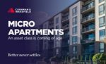 Facade of apartmentblocks - with text overlay Micro Apartments