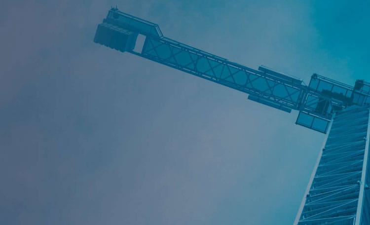 looking upwards at a crane blue duotone