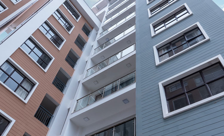 high rise apartment block looking up