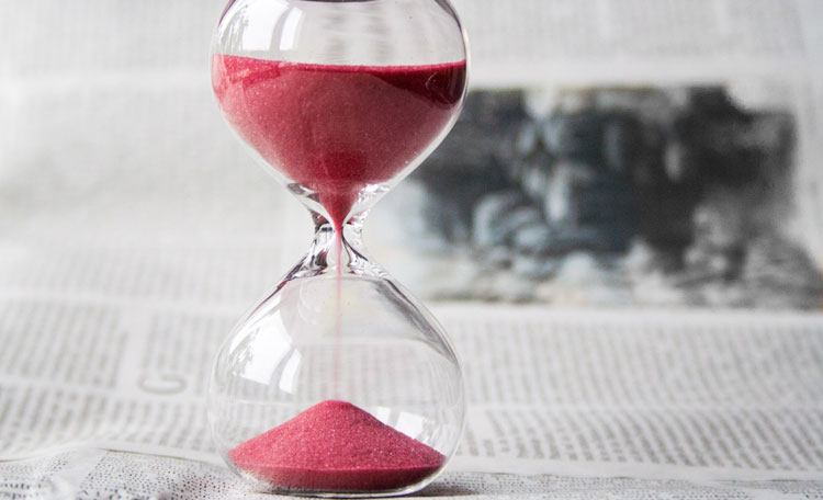 sand timer with red colour sand