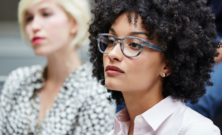 woman with glasses in workplace